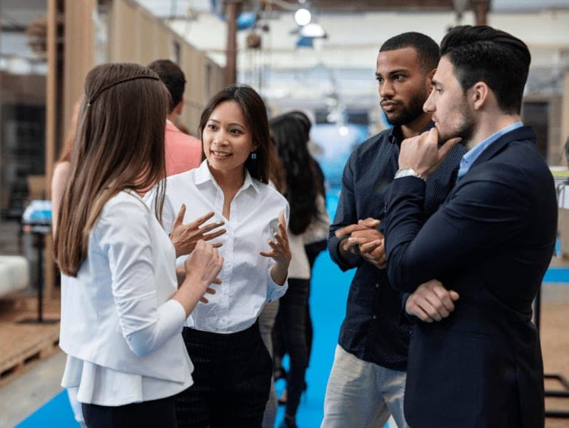 People having a discussion in a conference.