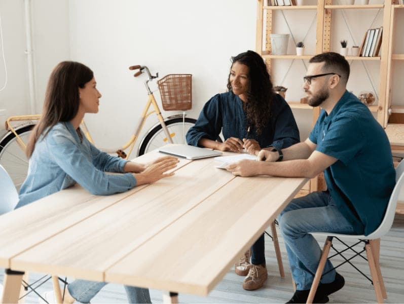 HR managers listening to candidate at job interview.