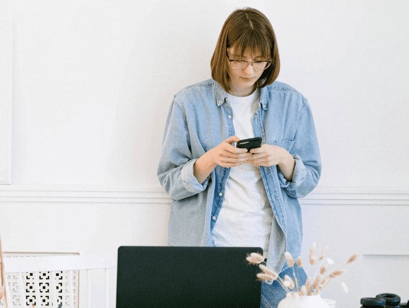 Woman texting on her smartphone.