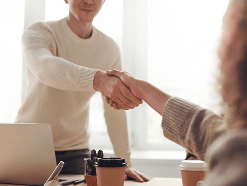 Two people shaking hands