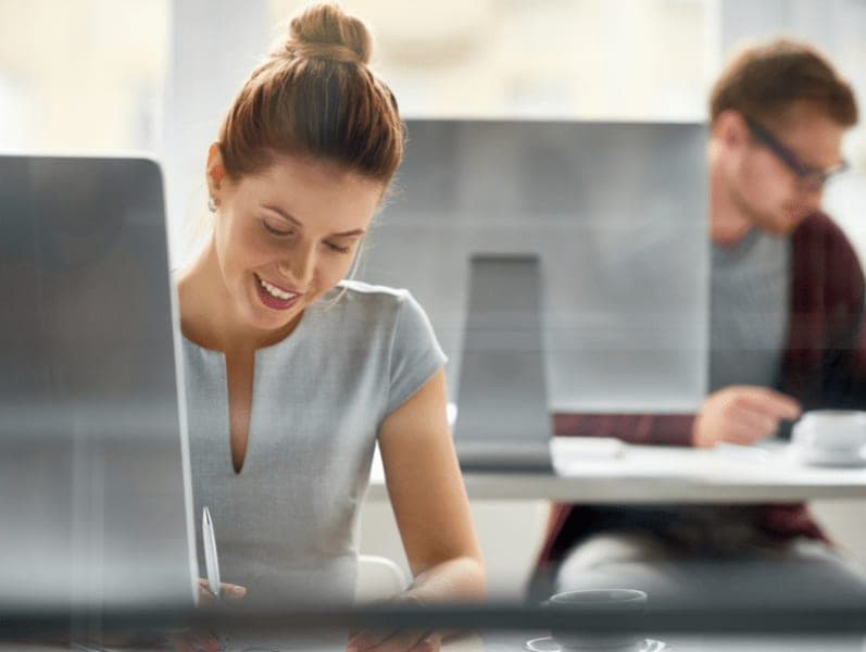 Female accountant working at her desk.