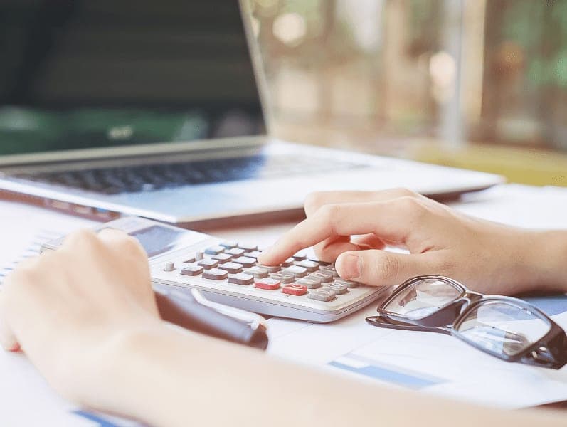 Man sitting at his desk reviewing blockchains impact on his accounting firm