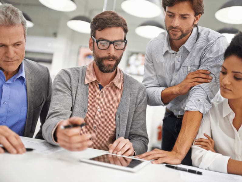 Group of accountants reviewing changes to the tax code.