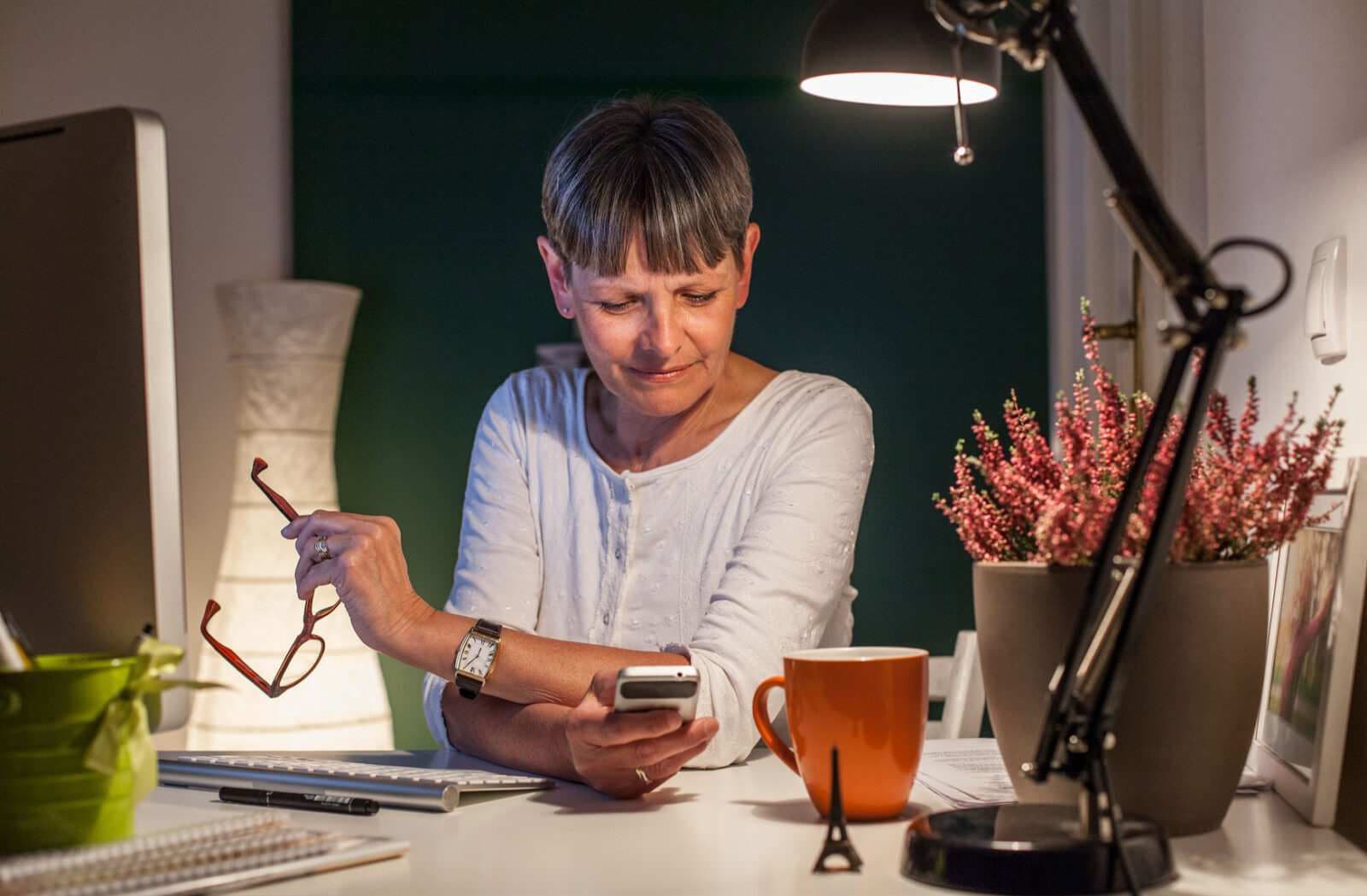 Senior woman looking at her phone