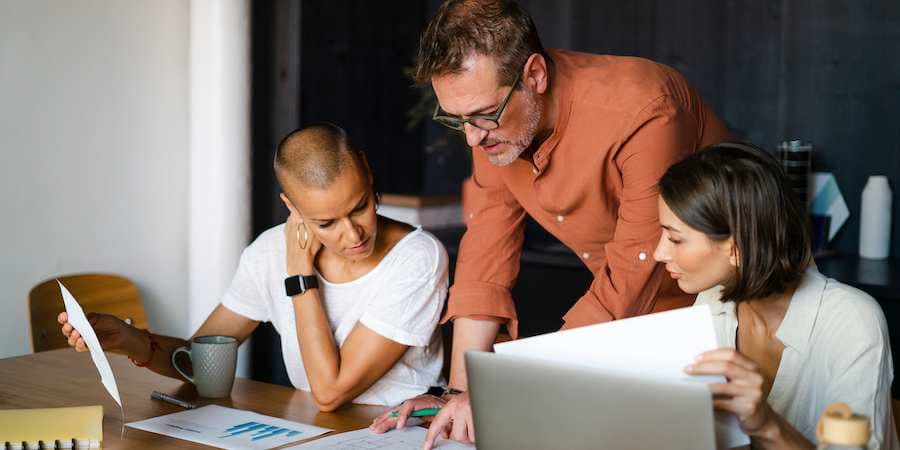 Business colleagues working together on a project.
