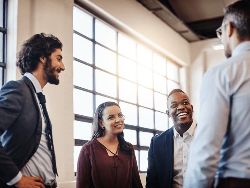 Business people chatting during their break in the office.