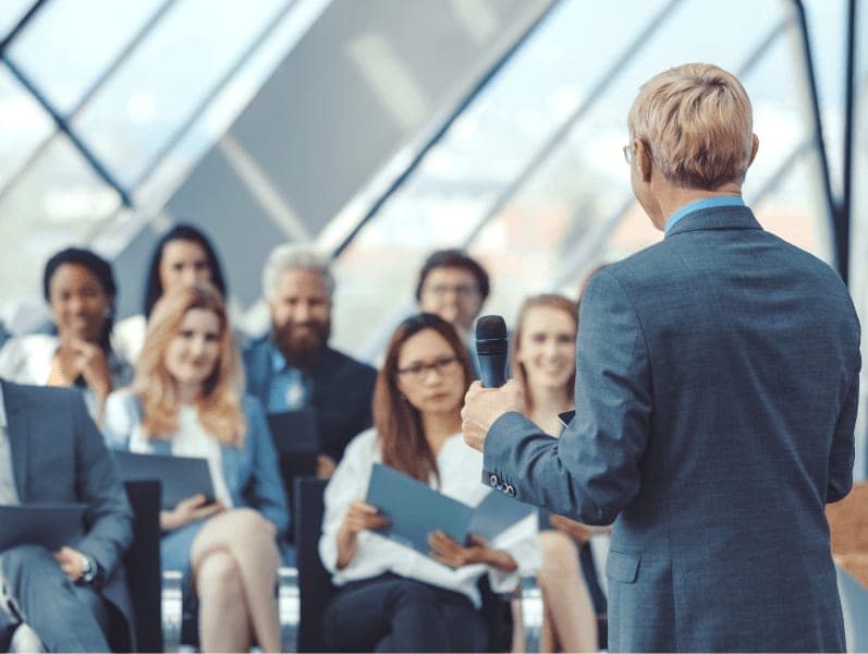 Business people at seminar.