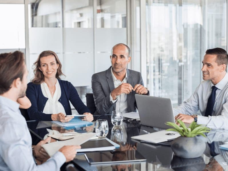Group of business people sitting in annual meeting in conference room