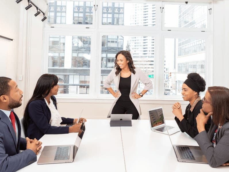 Female accounting manager leading a meeting.